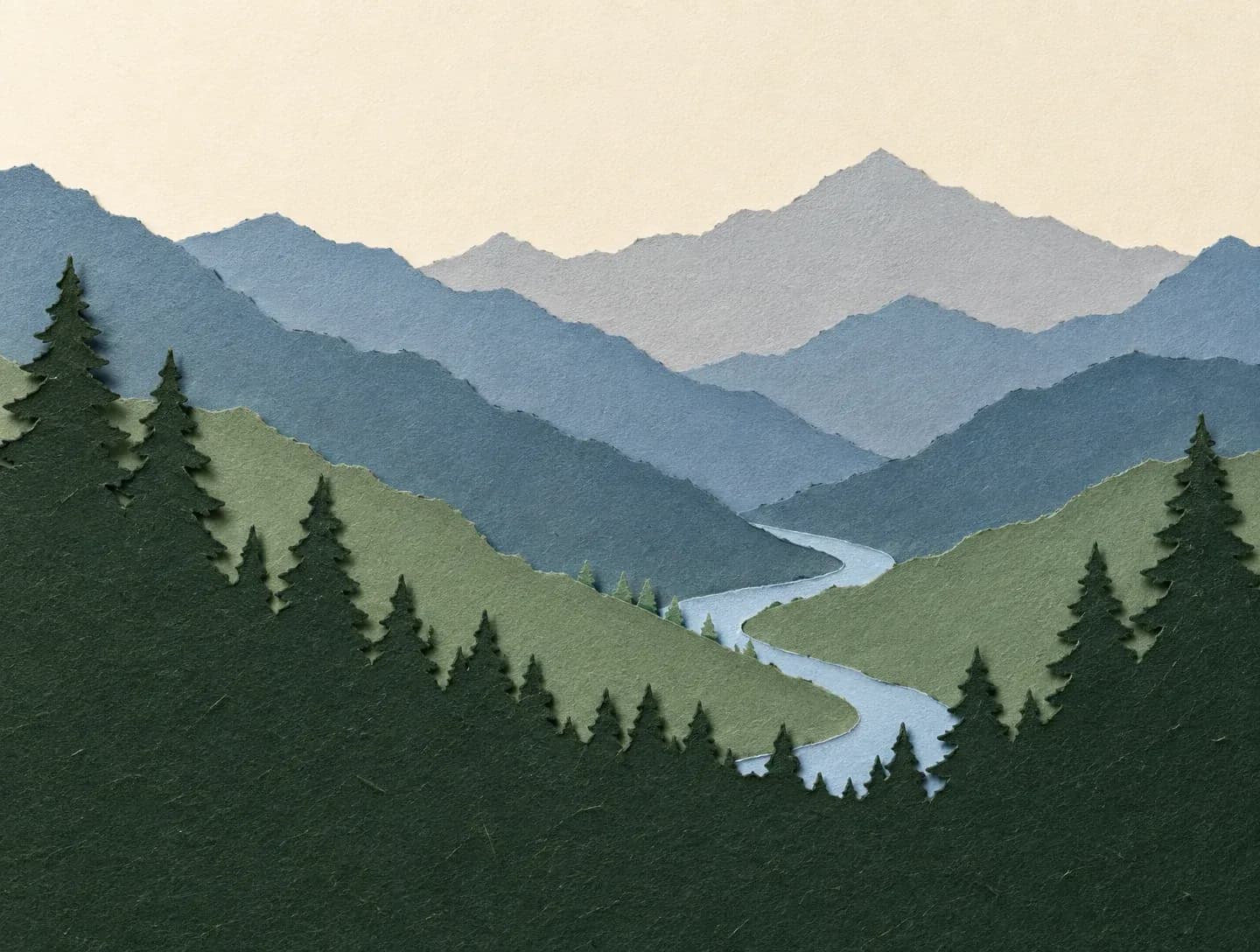 Cut paper illustration of a mountain valley in layered stacked planes